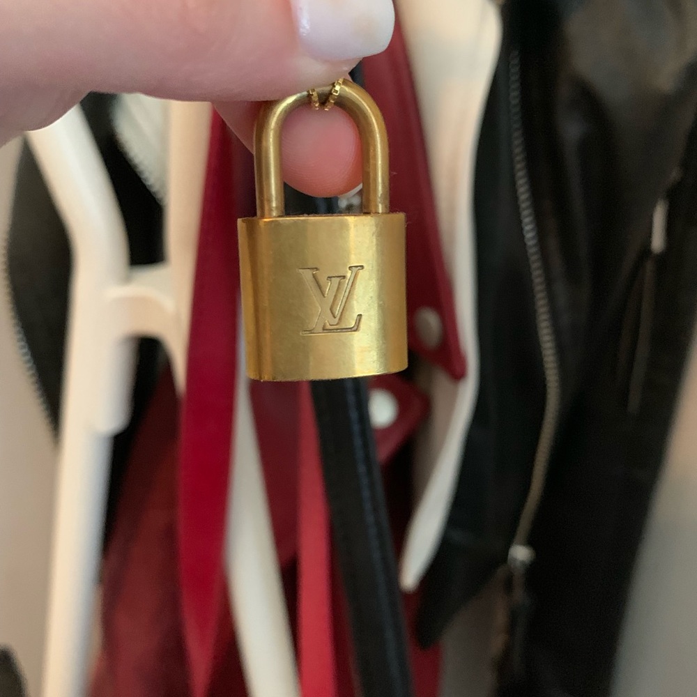 VINTAGE LOUIS VUITTON LOCK AND GOLD CHAIN